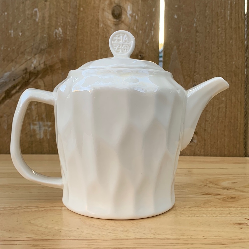 TAZO White ceramic Teapot interesting textured design. With strainer •chipped